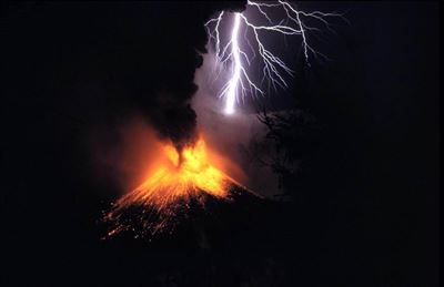 Volcanic eruption and lightening. Image via Wikimedia Commons.
