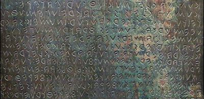 One of the Iguvine bronze tablets. Image via Wikimedia Commons.