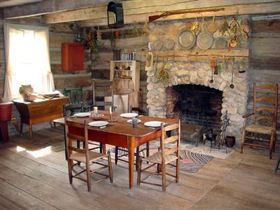 Kitchen of the reconstructed farm house of Peter Whitmer, Sr., where much of the Book of Mormon's translation take place. Photo by Bruce Satterfield. Image via emp.byui.edu.