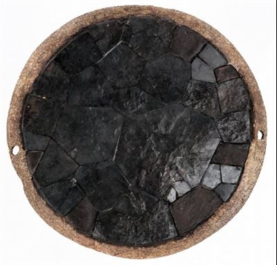 Maya mosaic pyrite mirror (AD 1000-1200). Image via twitter.com.