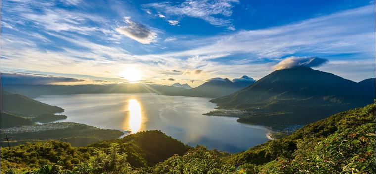 Lake Atitlan, in Guatemala. This site has sometimes been associated with the Waters of Mormon in the Book of Mormon. Image via selina.com.