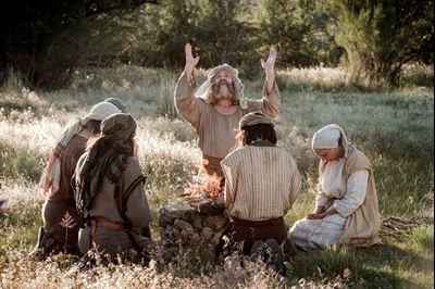 Lehi and family offer burnt sacrifice. Image via Gospel Media Library.